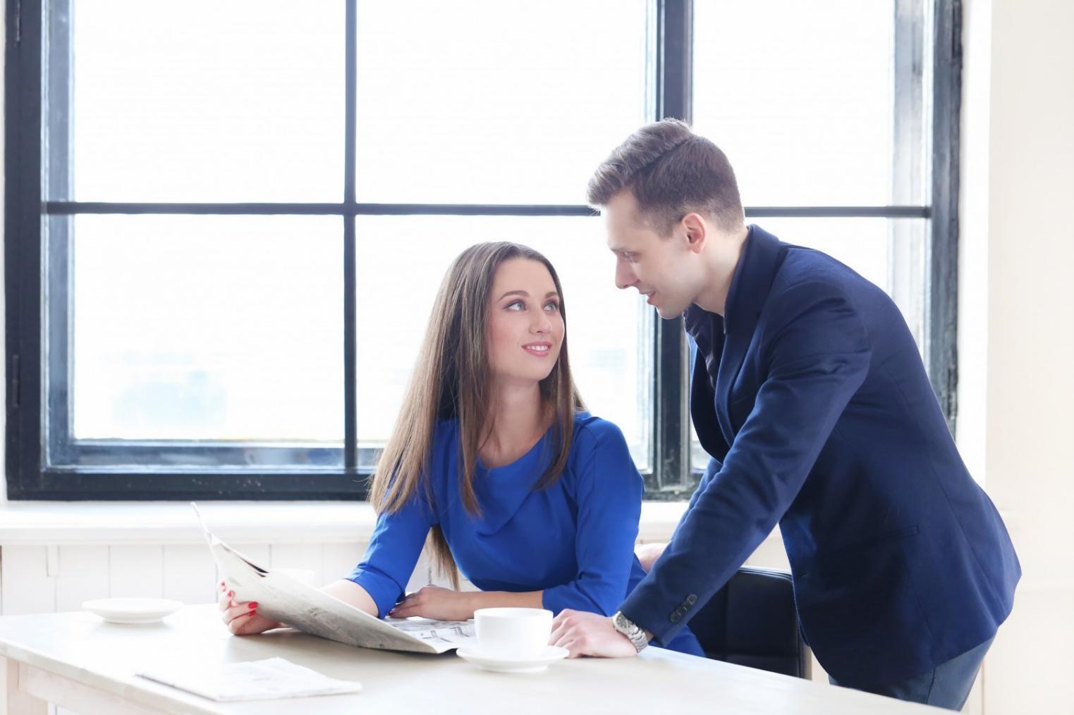 Investment professionals reviewing detailed financial models and market analysis