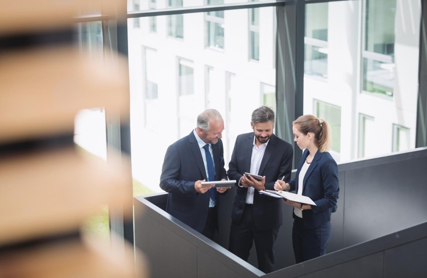 Professional financial analysis workspace with research materials and market data